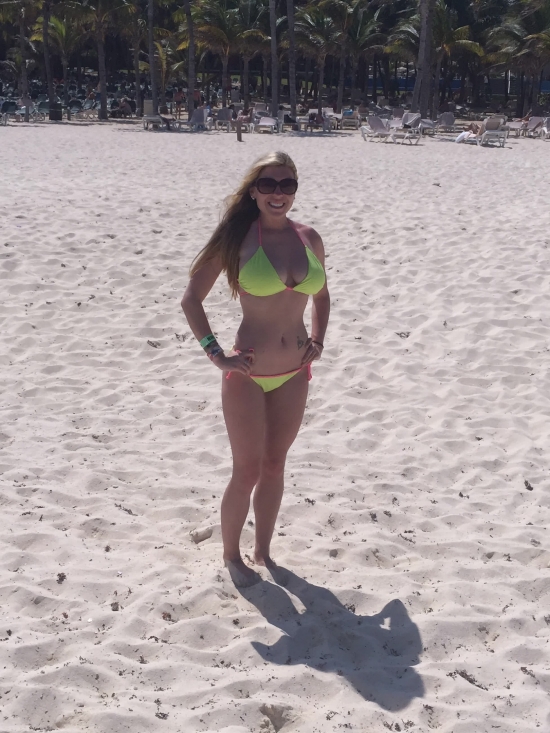 Busty blonde in bikini on the beach