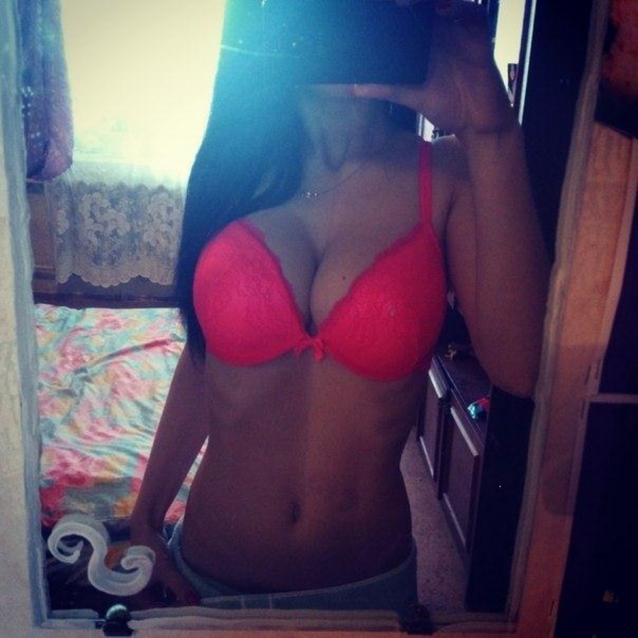 hot latina in pink bra selfie