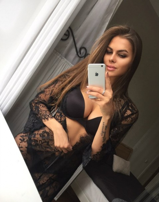 Beautiful babe in black lace lingerie and bra